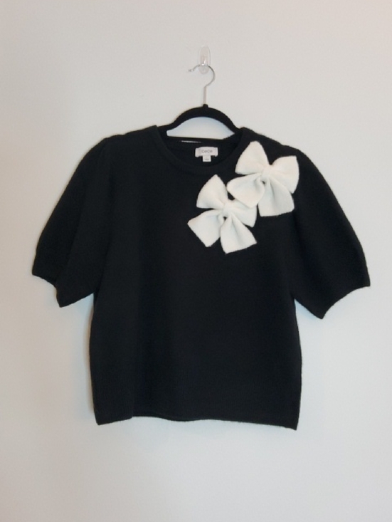 CeCe Sweaters - CeCe Black Knit Top with White Bow Cluster